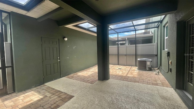 4450 Capital Blvd, Saint Cloud, FL 34769 - view of patio / terrace with central AC and a lanai