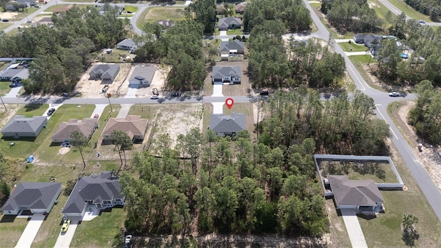 view of property location featuring nearby suburban area
