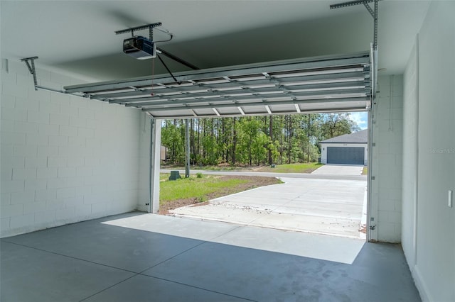garage featuring a garage door opener