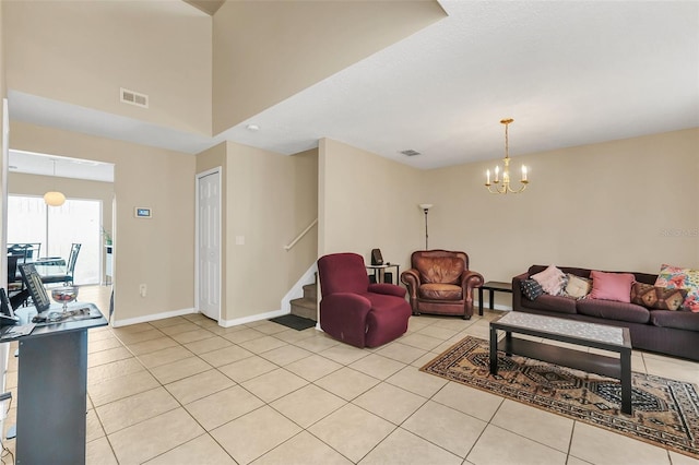 510 Lobelia Dr, Davenport, FL 33837 - living area featuring stairway, light tile patterned floors, baseboards, and a chandelier
