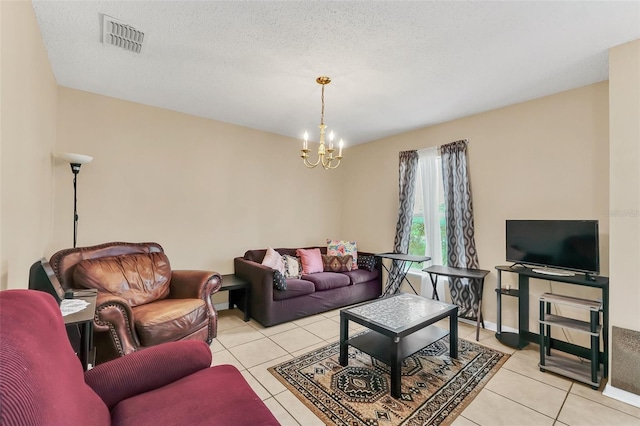 510 Lobelia Dr, Davenport, FL 33837 - living room featuring a chandelier and light tile patterned floors