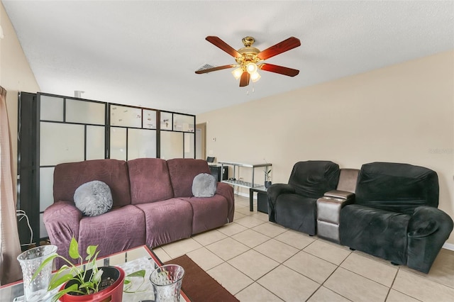 510 Lobelia Dr, Davenport, FL 33837 - living area with light tile patterned floors and ceiling fan
