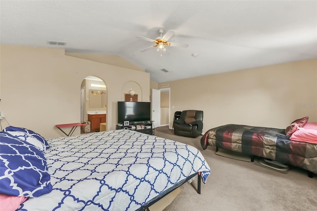 510 Lobelia Dr, Davenport, FL 33837 - bedroom with lofted ceiling, carpet flooring, arched walkways, and ceiling fan