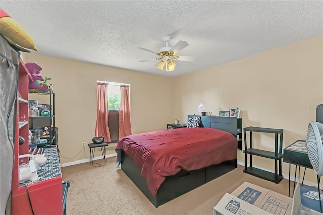 510 Lobelia Dr, Davenport, FL 33837 - carpeted bedroom with a textured ceiling, baseboards, and a ceiling fan