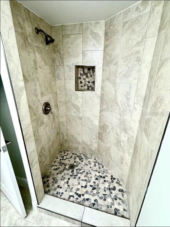 3621 Atrium Dr Unit U-4, Orlando, FL 32822 - bathroom with a shower stall and tile patterned flooring