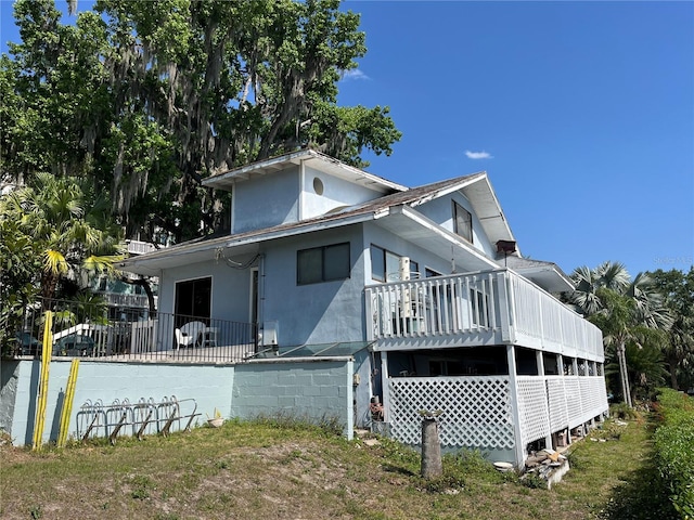 629 Helen St, Mount Dora, FL 32757 - view of property exterior with stucco siding