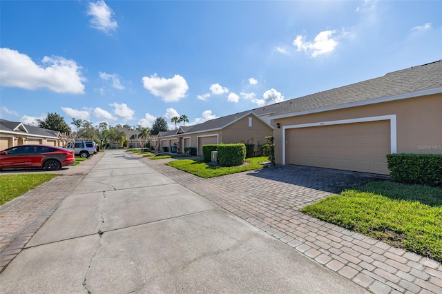 9141 Camden Gardens St, Orlando, FL 32827 - view of concrete road featuring a residential view