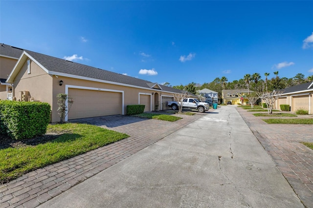 9141 Camden Gardens St, Orlando, FL 32827 - view of road with a residential view