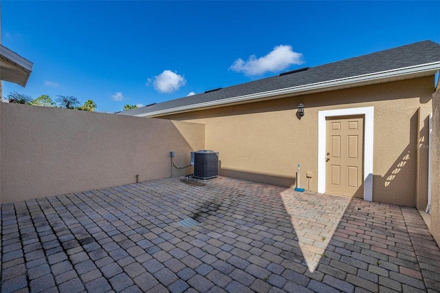 9141 Camden Gardens St, Orlando, FL 32827 - view of patio / terrace with central AC unit