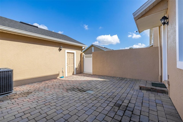 9141 Camden Gardens St, Orlando, FL 32827 - view of patio / terrace featuring cooling unit