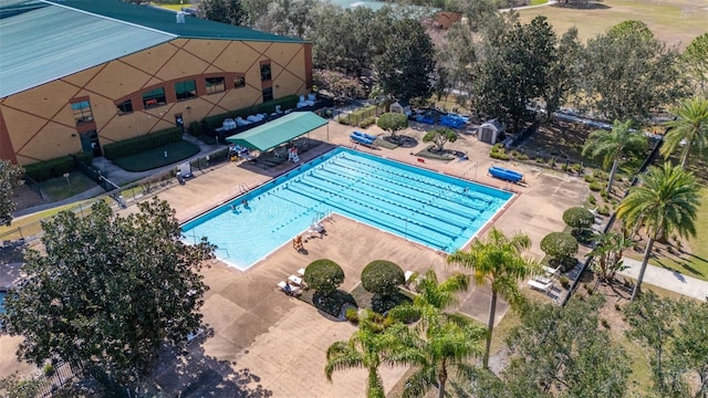 9141 Camden Gardens St, Orlando, FL 32827 - aerial view of a pool