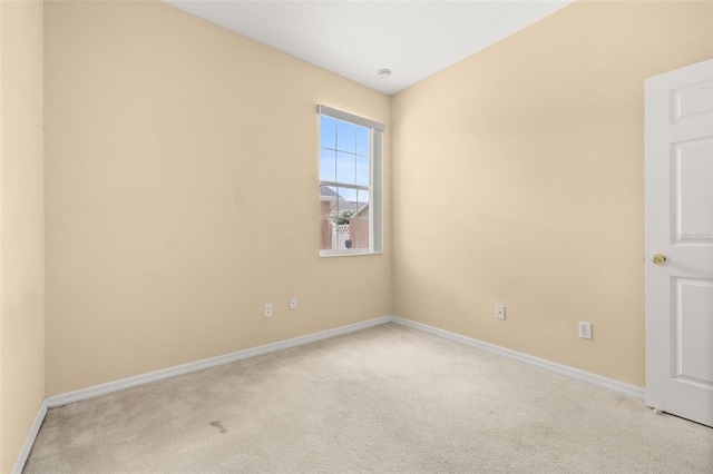 9141 Camden Gardens St, Orlando, FL 32827 - spare room featuring carpet flooring and baseboards
