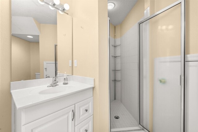 9141 Camden Gardens St, Orlando, FL 32827 - bathroom featuring a stall shower and vanity