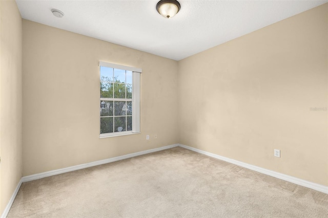 9141 Camden Gardens St, Orlando, FL 32827 - empty room with a smoke detector and carpet