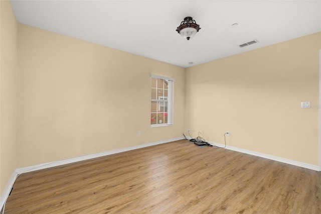 9141 Camden Gardens St, Orlando, FL 32827 - unfurnished room with light wood finished floors and baseboards