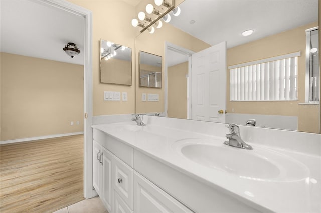 9141 Camden Gardens St, Orlando, FL 32827 - full bathroom with double vanity and tile patterned floors