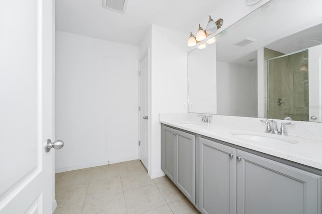 809 Benoi Dr, Davenport, FL 33896 - full bathroom featuring a shower stall, tile patterned floors, double vanity, and baseboards