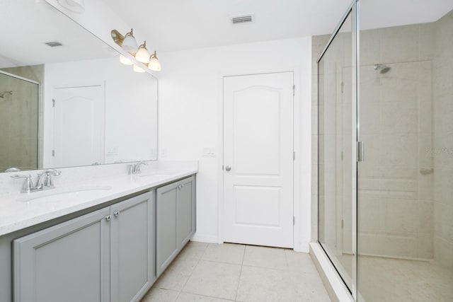 809 Benoi Dr, Davenport, FL 33896 - full bath with a shower stall, double vanity, and tile patterned floors