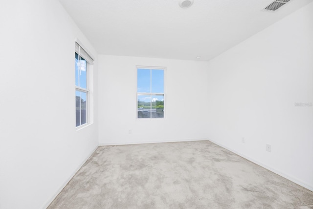 809 Benoi Dr, Davenport, FL 33896 - carpeted spare room featuring baseboards