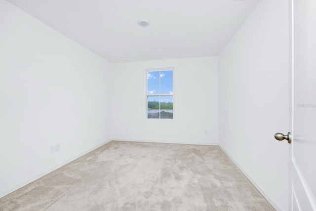809 Benoi Dr, Davenport, FL 33896 - empty room with light carpet and baseboards
