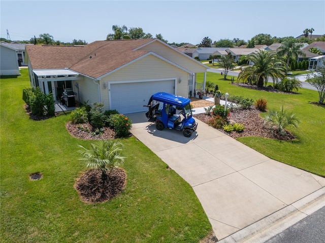 2167 Kerwood Loop, The Villages, FL 32162 - single story home with concrete driveway, a front lawn, and a garage