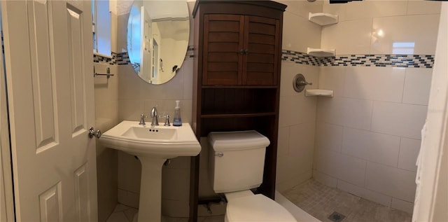 2411 SW 50th Ter, Plantation, FL 33317 - full bathroom with tile walls, toilet, and a shower stall