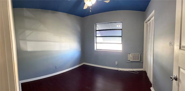 2411 SW 50th Ter, Plantation, FL 33317 - empty room with a ceiling fan, dark wood-style floors, baseboards, and an AC wall unit