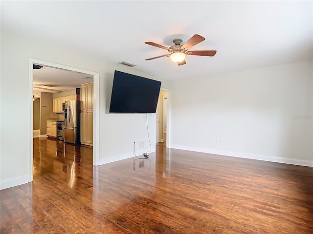 148 Tarrytown Trl, Longwood, FL 32750 - spare room featuring dark wood-style flooring, ceiling fan, and baseboards
