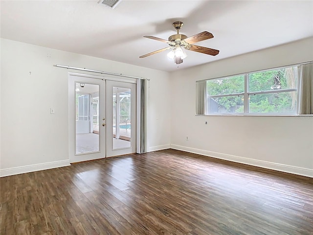 148 Tarrytown Trl, Longwood, FL 32750 - spare room featuring french doors, wood finished floors, baseboards, and a ceiling fan