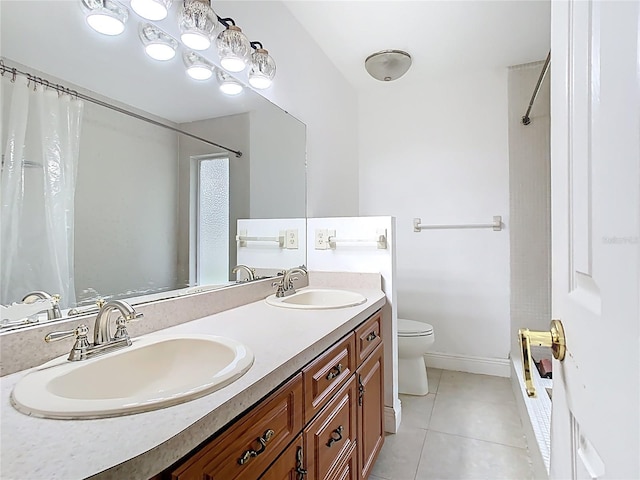148 Tarrytown Trl, Longwood, FL 32750 - bathroom with tile patterned floors, toilet, double vanity, curtained shower, and baseboards
