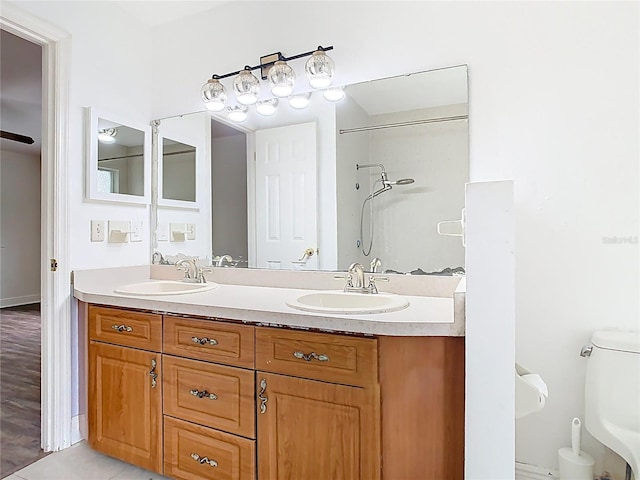 148 Tarrytown Trl, Longwood, FL 32750 - bathroom featuring double vanity, toilet, and a shower
