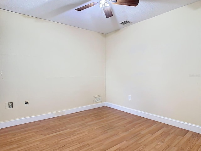 148 Tarrytown Trl, Longwood, FL 32750 - spare room with light wood-style floors, ceiling fan, and baseboards