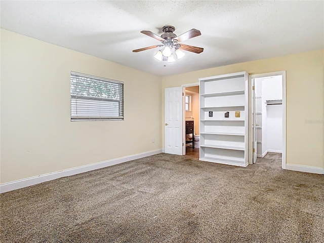 148 Tarrytown Trl, Longwood, FL 32750 - unfurnished bedroom featuring carpet floors, baseboards, a walk in closet, and a closet