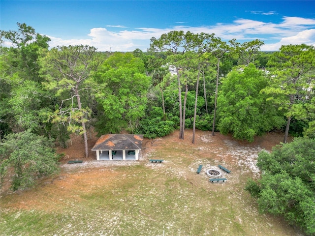 148 Tarrytown Trl, Longwood, FL 32750 - aerial view of property and surrounding area featuring a heavily wooded area