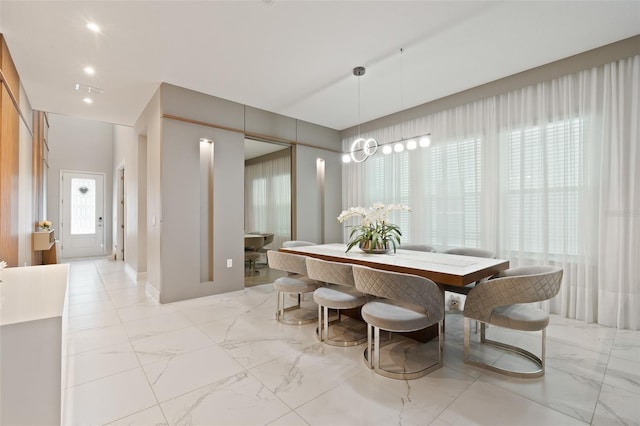9845 Emerald Berry Dr, Winter Garden, FL 34787 - dining room with light marble finish floors