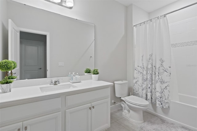 9845 Emerald Berry Dr, Winter Garden, FL 34787 - full bathroom featuring vanity, toilet, shower / tub combo with curtain, tile patterned floors, and baseboards