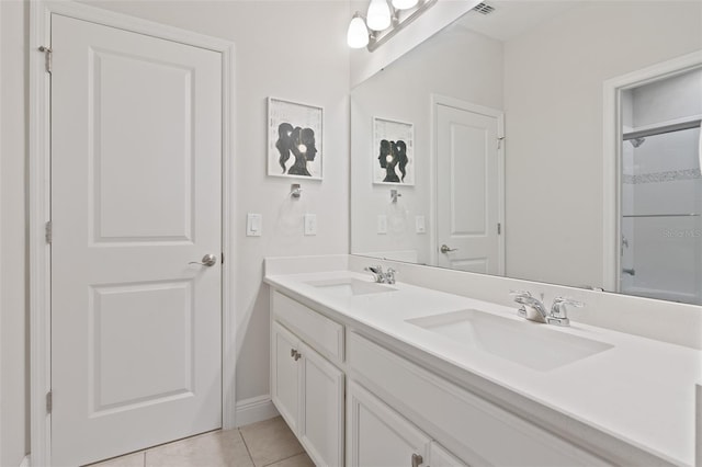 9845 Emerald Berry Dr, Winter Garden, FL 34787 - full bath with double vanity, tile patterned floors, a shower, and baseboards