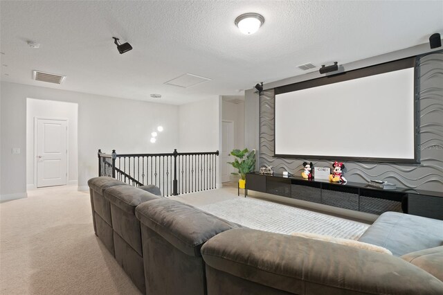 9845 Emerald Berry Dr, Winter Garden, FL 34787 - cinema featuring light carpet, a textured ceiling, and baseboards