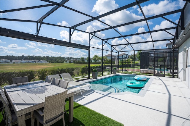 9845 Emerald Berry Dr, Winter Garden, FL 34787 - outdoor pool with a patio area, a lanai, and outdoor dining area