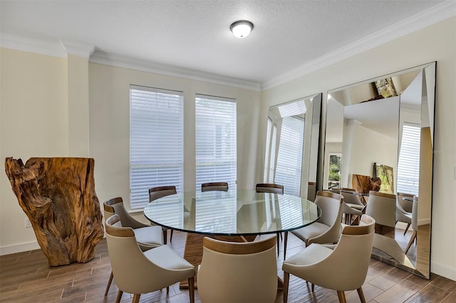 8430 Woburn Ct, Windermere, FL 34786 - dining room featuring wood finished floors, crown molding, baseboards, and a textured ceiling