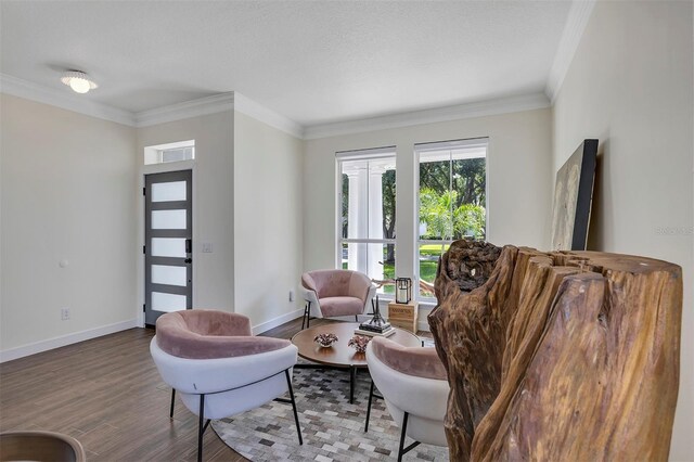 8430 Woburn Ct, Windermere, FL 34786 - living room with wood finished floors, baseboards, and ornamental molding