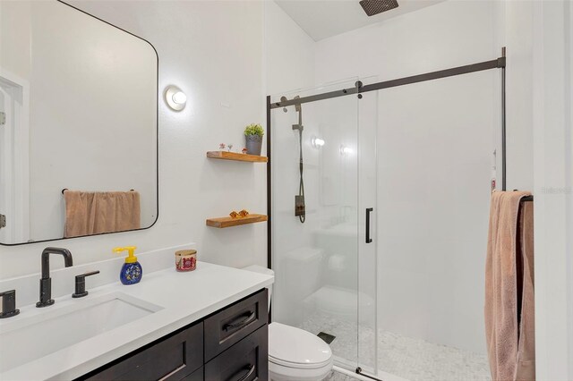 8430 Woburn Ct, Windermere, FL 34786 - bathroom with vanity, a stall shower, and toilet