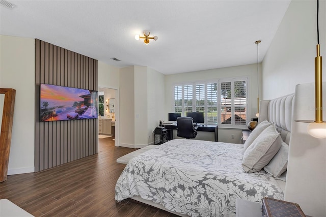 8430 Woburn Ct, Windermere, FL 34786 - bedroom featuring dark wood-style floors, baseboards, and a desk