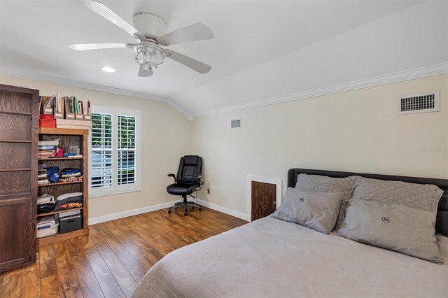 8430 Woburn Ct, Windermere, FL 34786 - bedroom featuring ornamental molding, vaulted ceiling, wood finished floors, baseboards, and ceiling fan