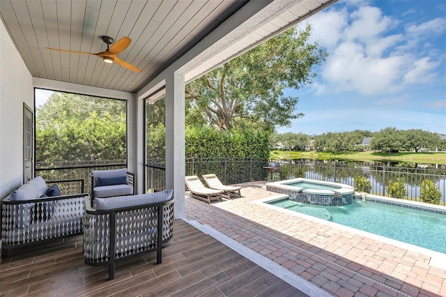 8430 Woburn Ct, Windermere, FL 34786 - view of pool with a water view, ceiling fan, a fenced backyard, a pool with connected hot tub, and a patio
