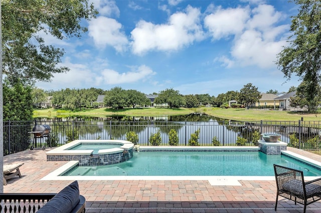8430 Woburn Ct, Windermere, FL 34786 - view of swimming pool featuring a fenced backyard, a pool with connected hot tub, a patio area, and a water view