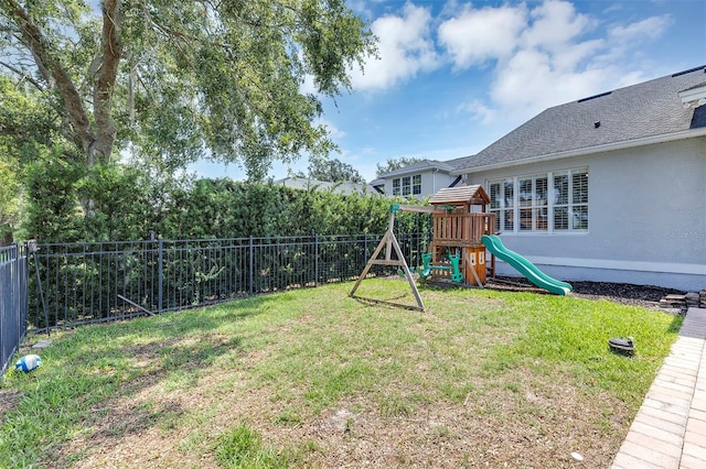 8430 Woburn Ct, Windermere, FL 34786 - view of yard with a playground