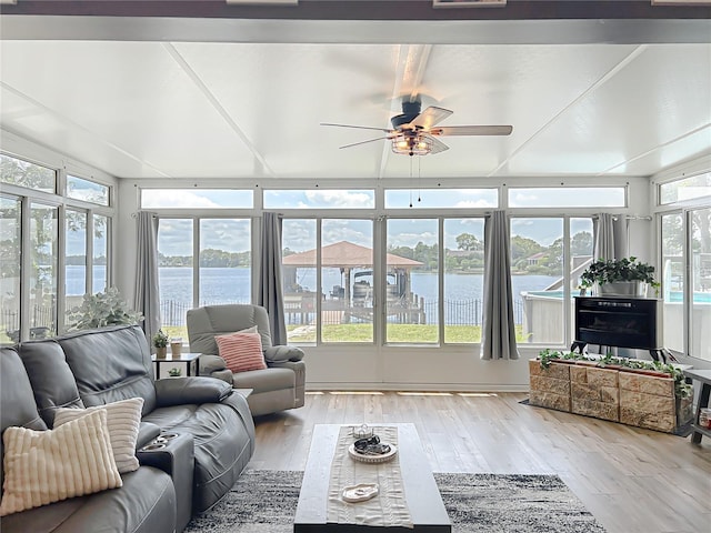 3788 N Econlockhatchee Trl, Orlando, FL 32817 - sunroom with wood finished floors and a water view