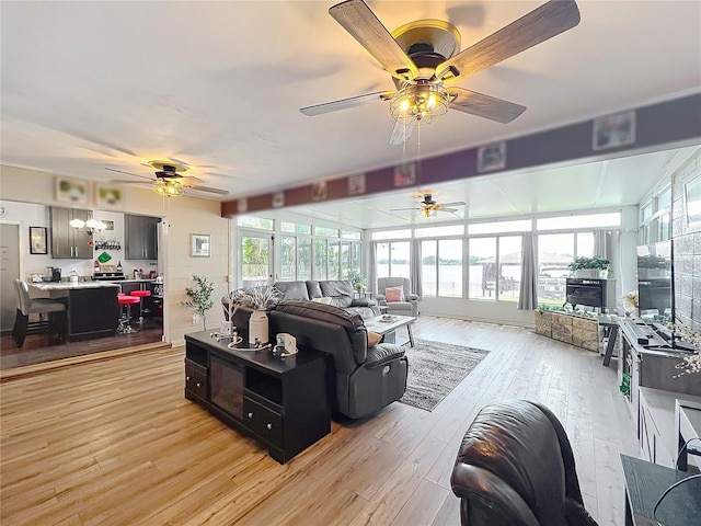 3788 N Econlockhatchee Trl, Orlando, FL 32817 - living room with ceiling fan and light wood-style flooring
