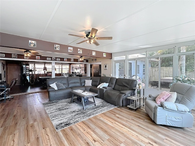 3788 N Econlockhatchee Trl, Orlando, FL 32817 - living area featuring a ceiling fan, wood finished floors, and plenty of natural light